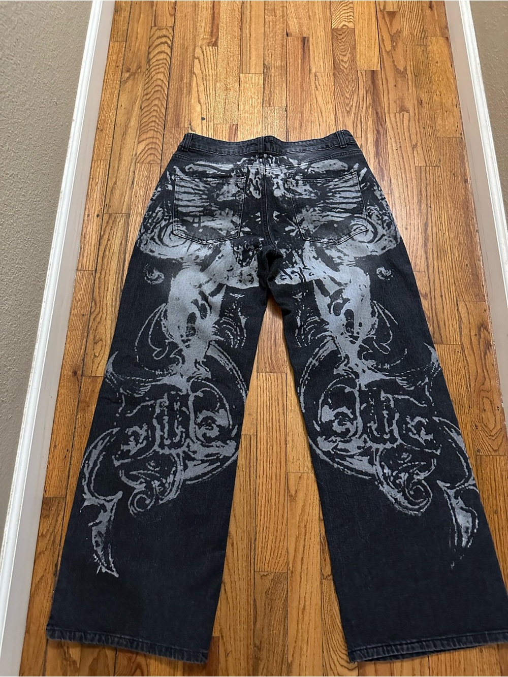 Women's Black Relaxed Jeans with Graphic Print